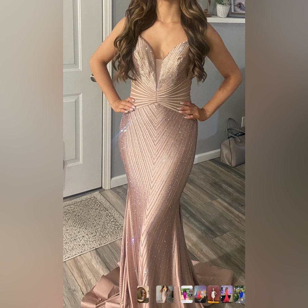 Gorgeous beaded rose gold gown.